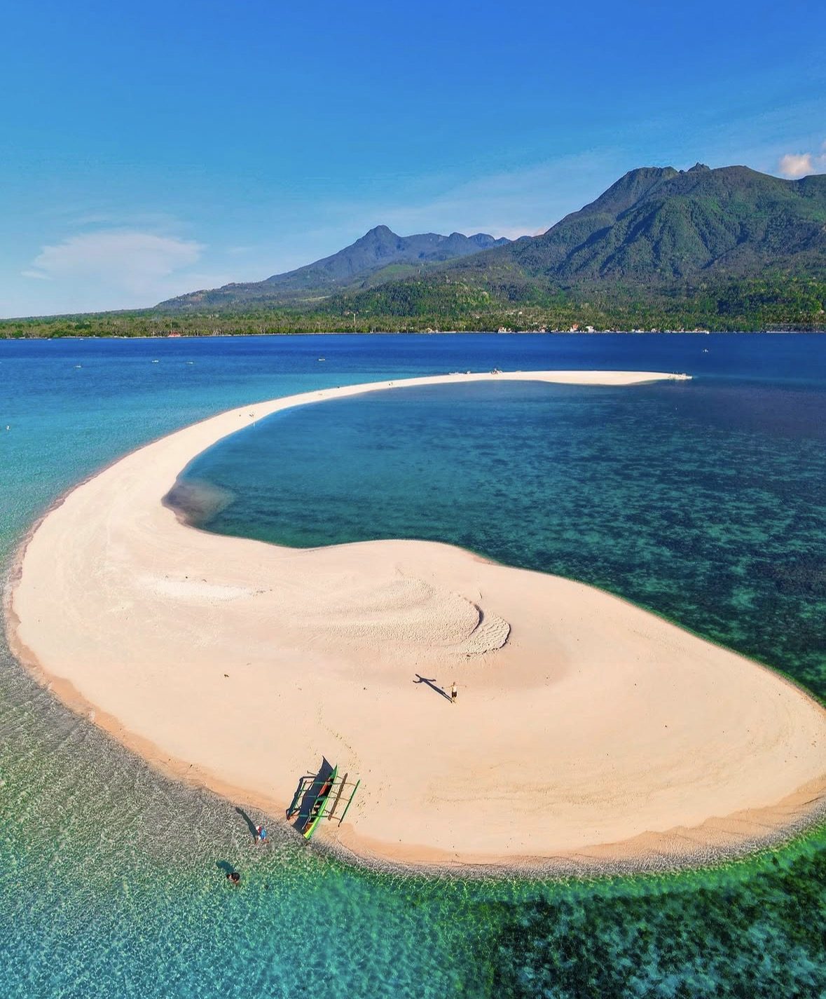 Local Camiguin Island culture lanzones festival street dancing and heritage church Philippines travel tips